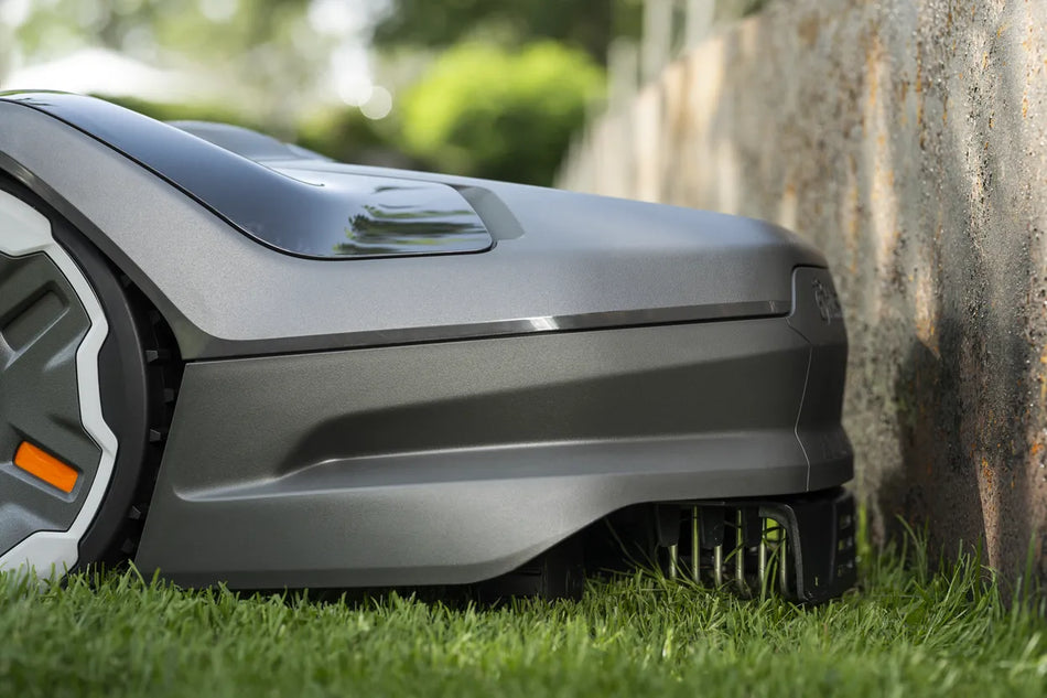 Husqvarna Automower® 405XE NERA - Robotic mower that trims the edges and avoids objects on the lawn.